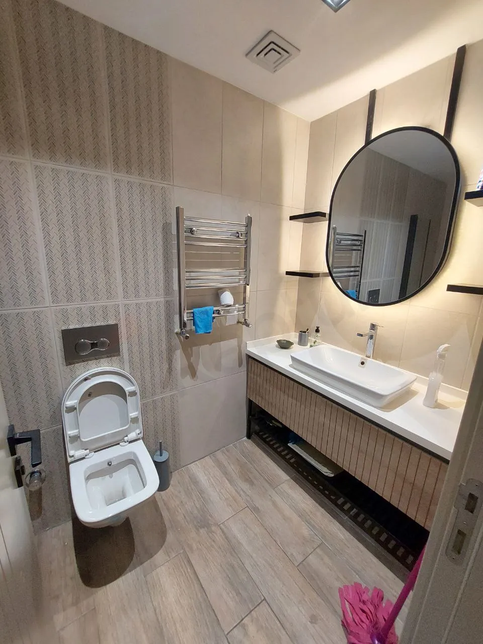 Modern and stylishly designed, spacious bathroom interior view.