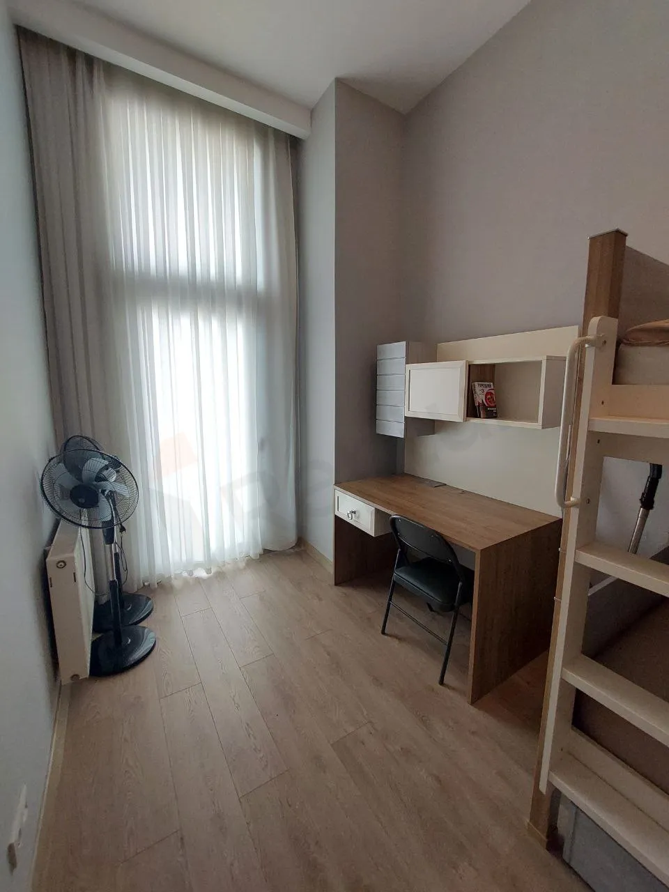 Modern and bright interior view of the study room in a 2+1 apartment located in Beylikdüzü.