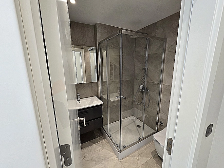 Modern designed, bright and spacious bathroom.