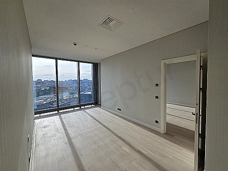 Modern bedroom interior with double bed, nightstands, and stylish lighting.
