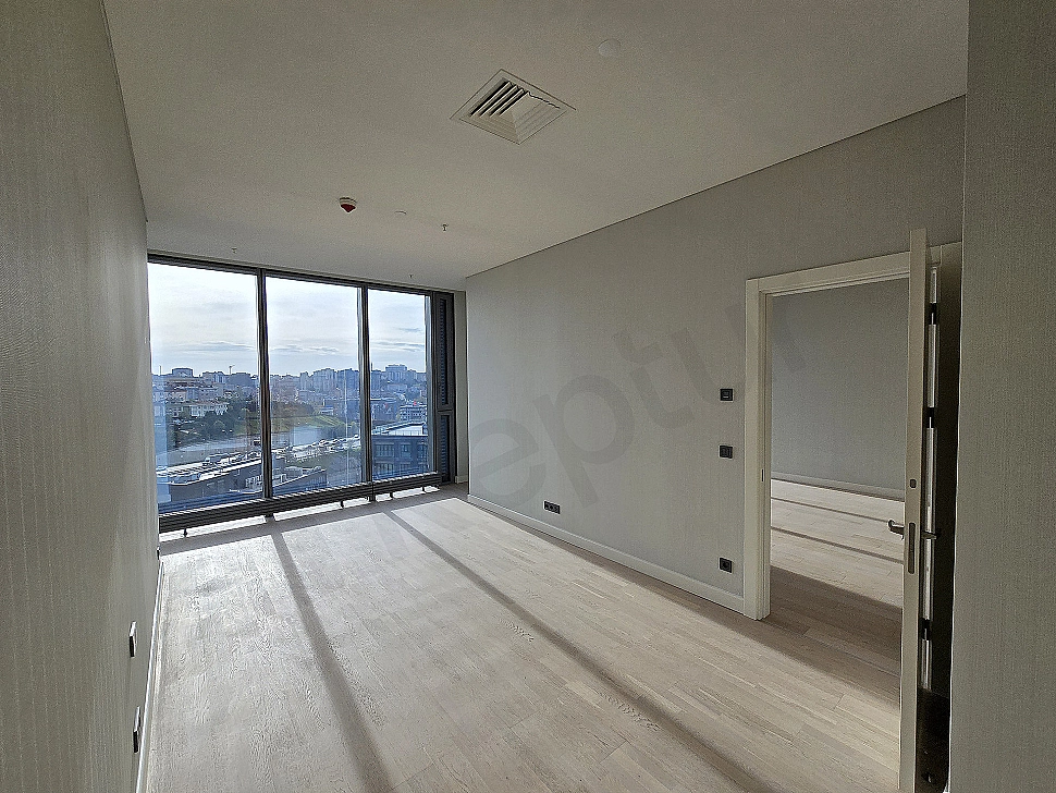 Modern bedroom interior with double bed, nightstands, and stylish lighting.