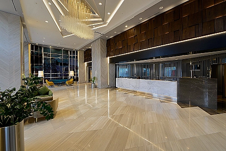 Modern building entrance facade, glass and metal details