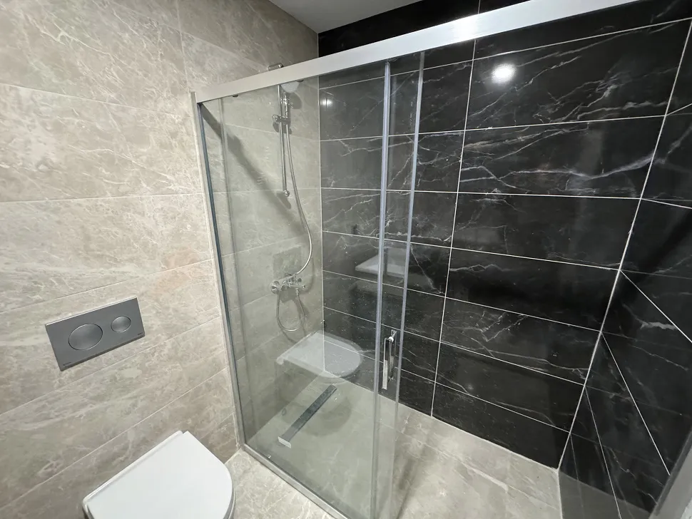 Modern bathroom interior design with spacious and bright layout.
