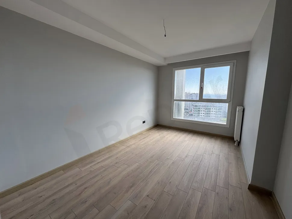 A spacious and bright bedroom image with a modern design.