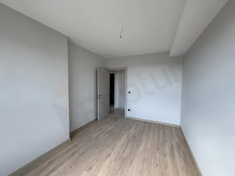 View of a modern and spacious bedroom in a new project in Beylikdüzü, Istanbul.