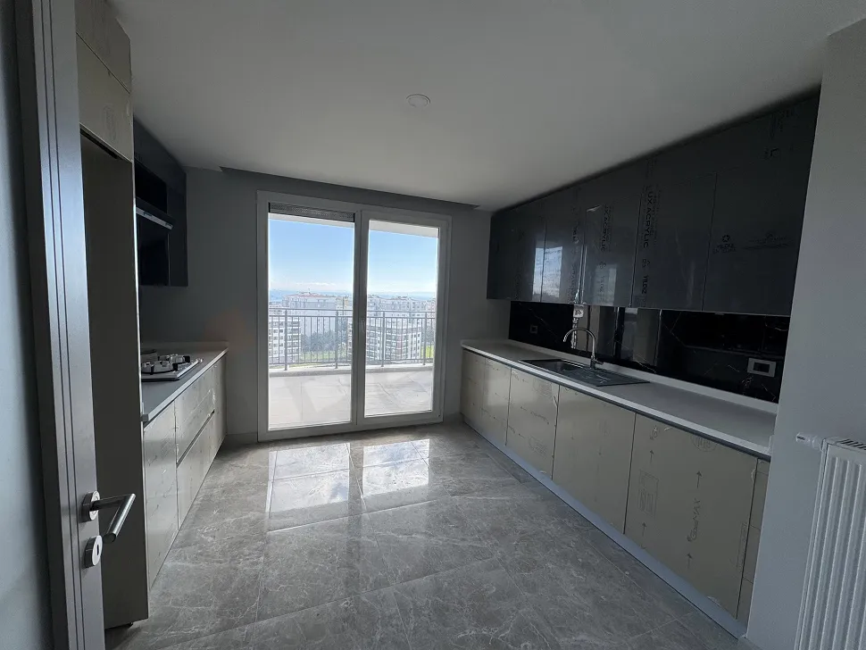 Interior view of a modern and spacious kitchen.