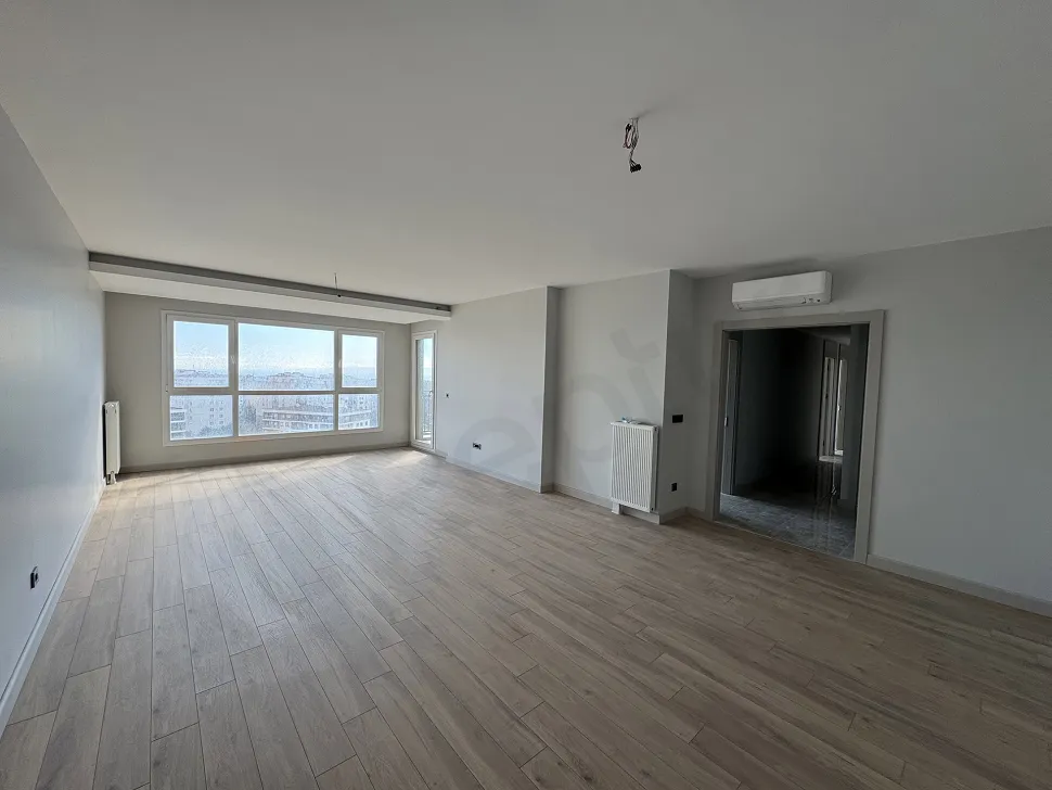 Spacious living room with large windows and modern architecture in Beylikdüzü.