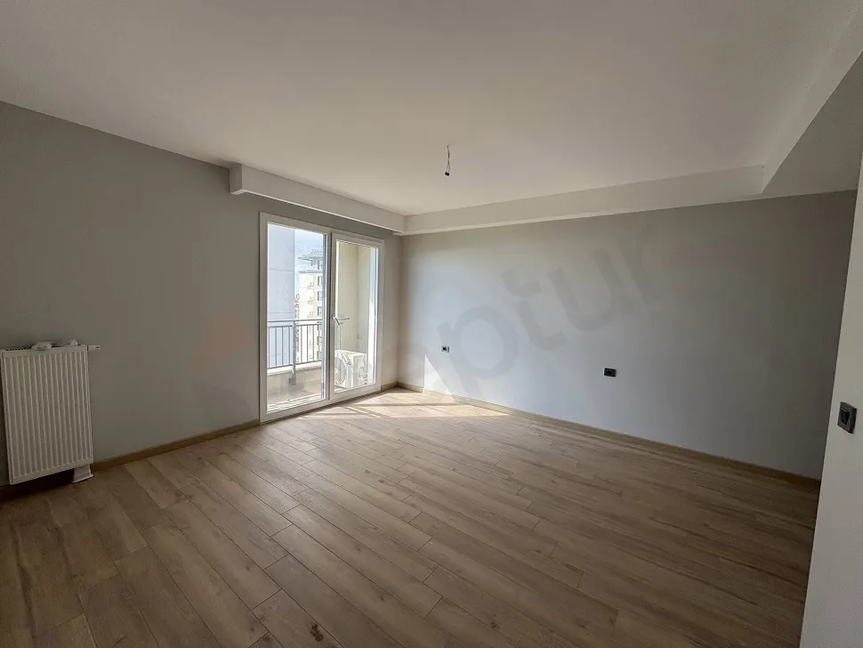 Interior view of a spacious and modern bedroom.