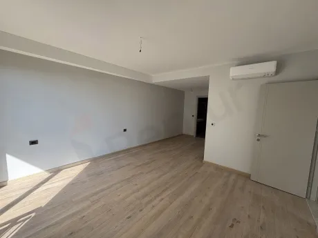 Interior view of a modern and spacious bedroom