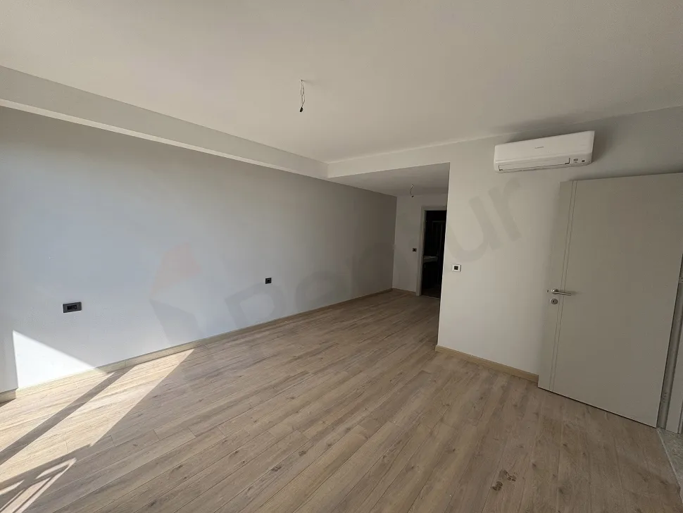 Interior view of a modern and spacious bedroom