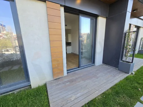 Large and spacious terrace area with city views in a modern building in Sisli, Istanbul.