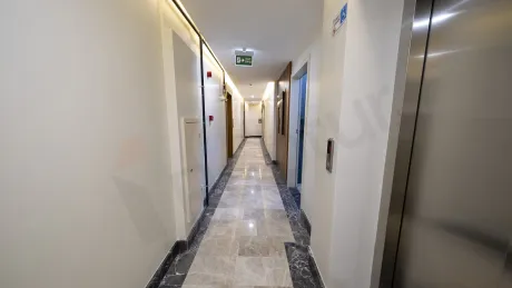 Modern design elevator cabin interior with mirrors in a building.