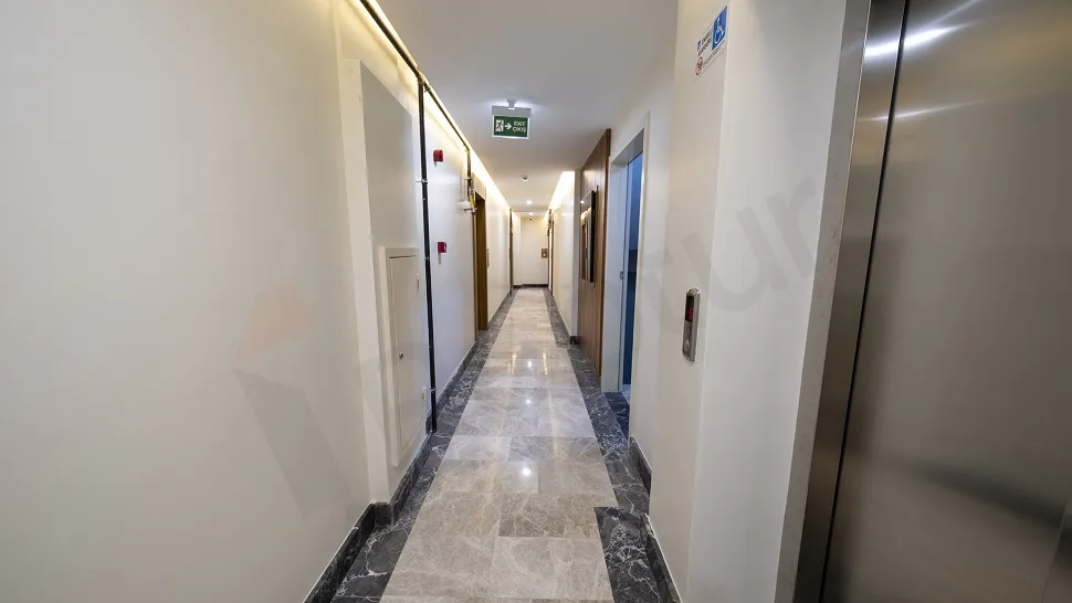 Modern design elevator cabin interior with mirrors in a building.