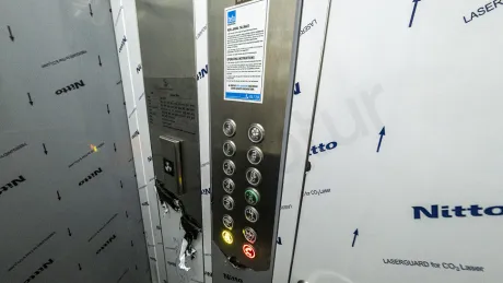 Interior elevator design of a modern and secure building.