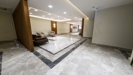 Modern and stylishly designed entrance lobby area of a large building.