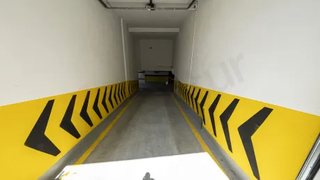 Modern, spacious, and secure indoor parking area.