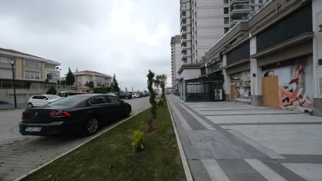 Modern and spacious outdoor parking area of a residential complex.