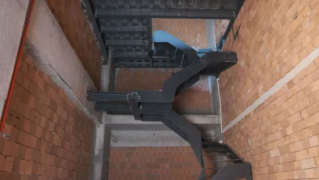 Modern interior staircase design and step details inside a shop.