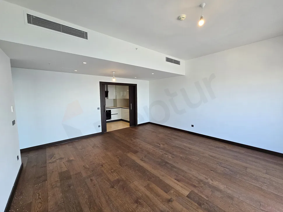 A modern, spacious, and bright living room area located in Şişli, Istanbul.