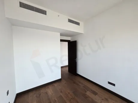 Spacious and bright bedroom interior of a modern residence apartment in Sisli.