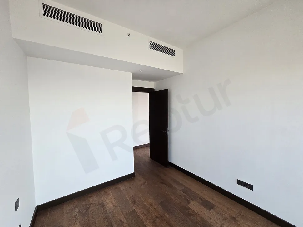 Spacious and bright bedroom interior of a modern residence apartment in Sisli.