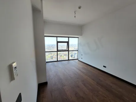 Modern and spacious bedroom interior view.