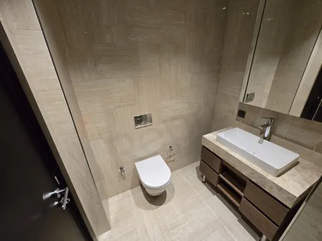 Modernly designed, stylish and spacious bathroom area.