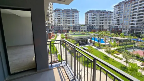 Resort-Style Vista: Spacious 4+1 Residence with Dual Balconies Overlooking the Pool