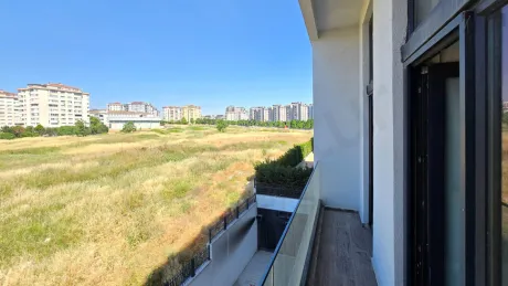 Spacious and modernly designed apartment balcony.