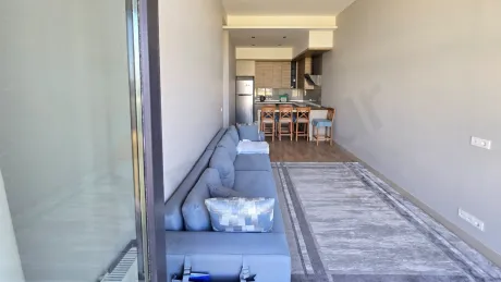 Spacious and bright living room area with modern architecture.