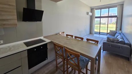 Modernly designed, spacious and bright dining room area.