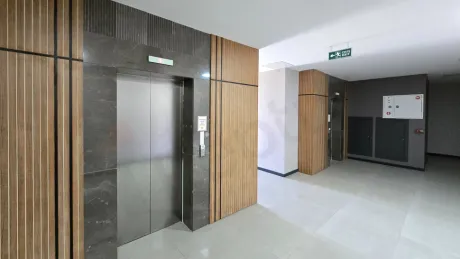Modern and secure elevator doors in a contemporary residential building.