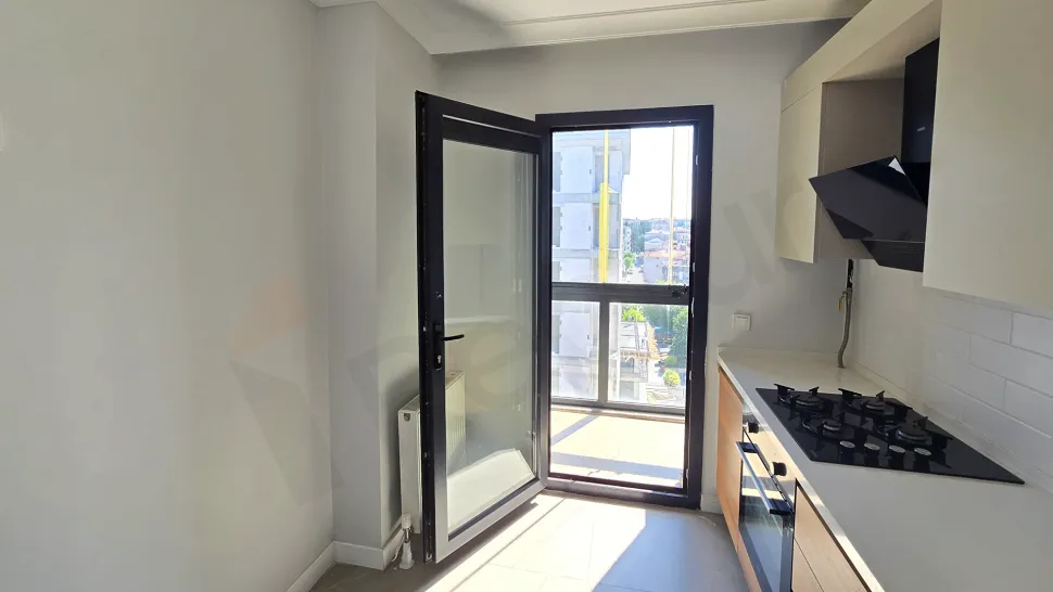 Modern and spacious kitchen area of the apartment for sale in Istanbul Kucukcekmece