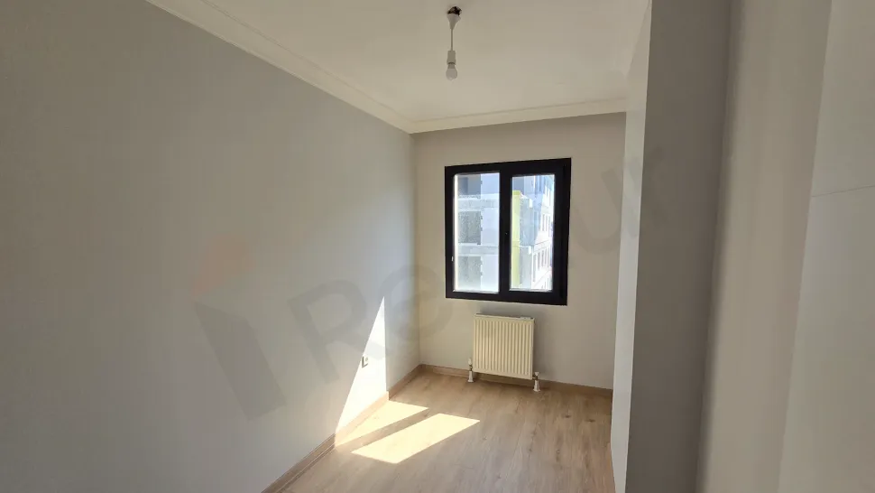 Spacious and bright bedroom area of a modern apartment located in Küçükçekmece, Istanbul.