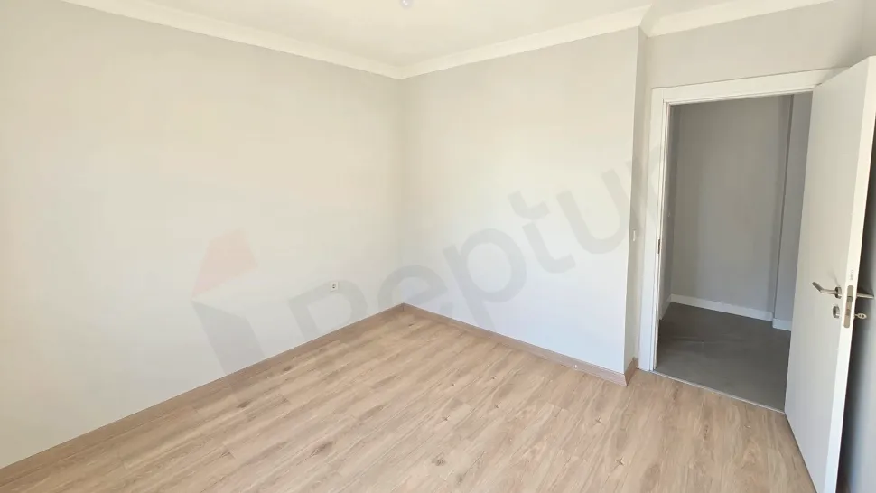 Image of a spacious and bright bedroom in a modern apartment in Kucukcekmece, Istanbul.