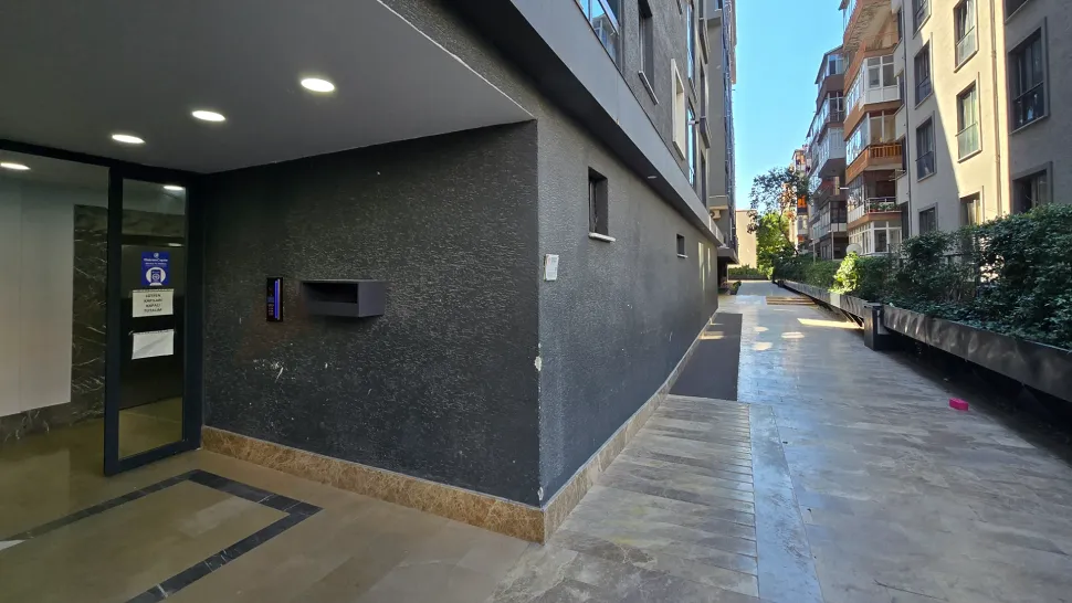 Main security entrance gate of a residential complex with 24/7 security service.