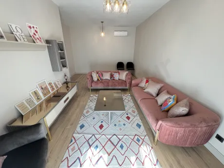 Interior view of a spacious and bright living room.