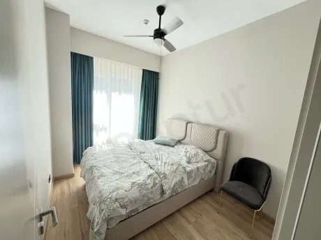 Spacious and bright bedroom area of the apartment for sale in Kartal, Istanbul.