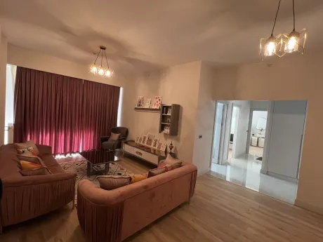 Spacious, bright, and modern empty living room area with large windows.
