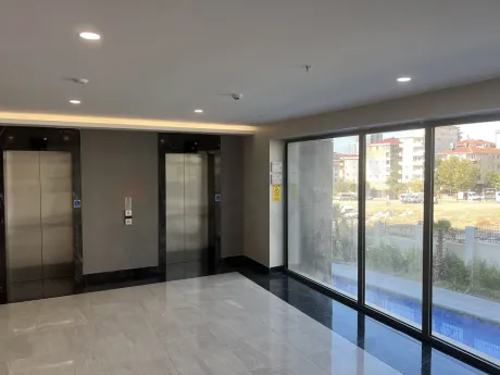 Interior view of a modern and stylish elevator cabin in a contemporary building
