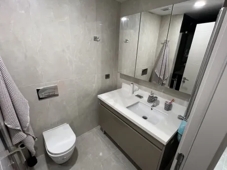Modern bathroom design with stylish ceramic tiles and fixtures.