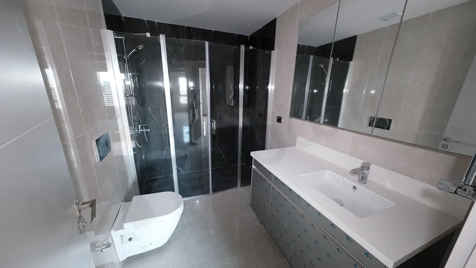 Modernly designed, stylish bathroom interior with high-quality ceramic tiles.