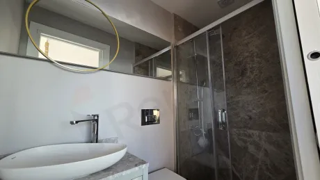 Exclusive 3-Story Luxury Villa for Sale in Milas with Sea Views