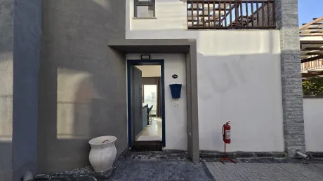 Exclusive 3-Story Luxury Villa for Sale in Milas with Sea Views