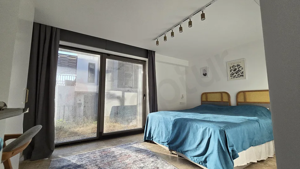 Exclusive 3-Story Luxury Villa for Sale in Milas with Sea Views