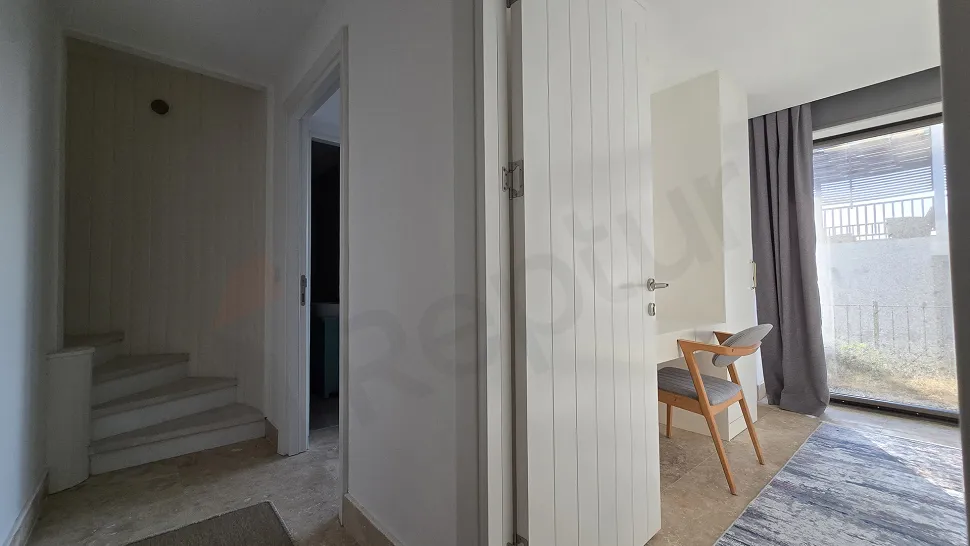 Exclusive 3-Story Luxury Villa for Sale in Milas with Sea Views