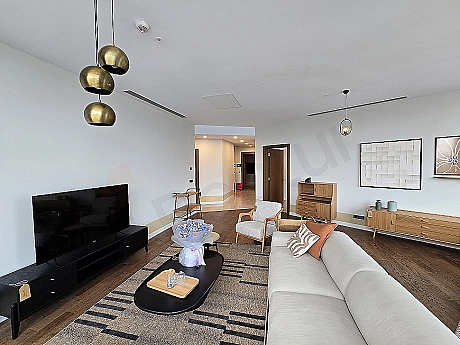 Detail of a modernly designed, spacious and bright living room.