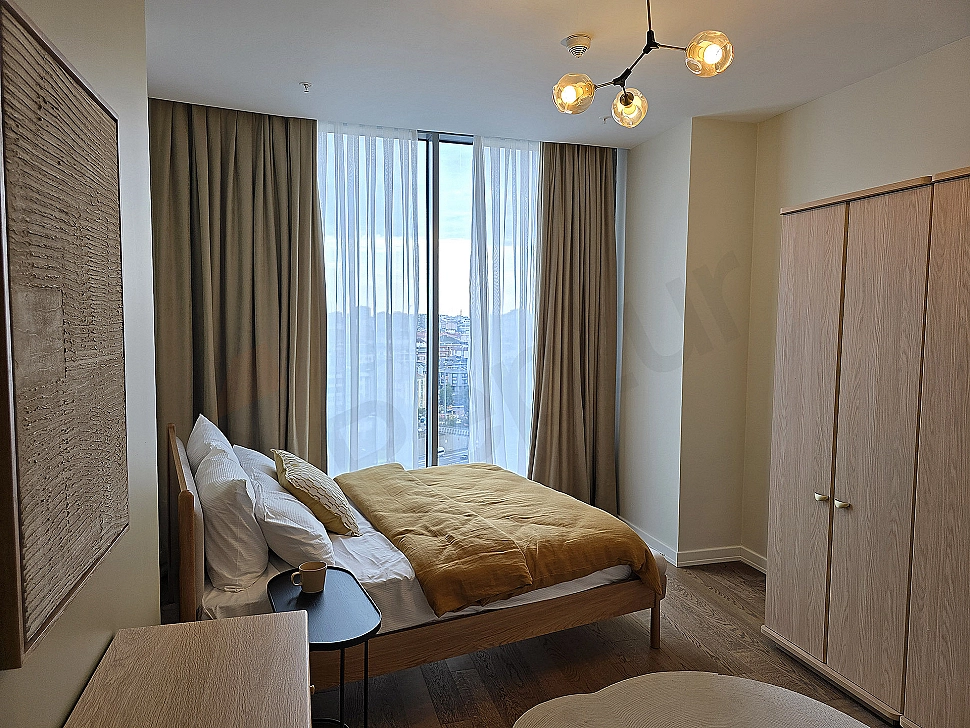 Stylish and modern designed, bright bedroom.