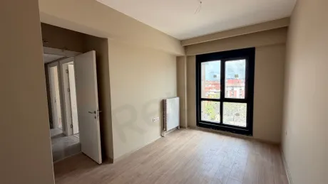 Bedroom area of a modern and bright apartment.