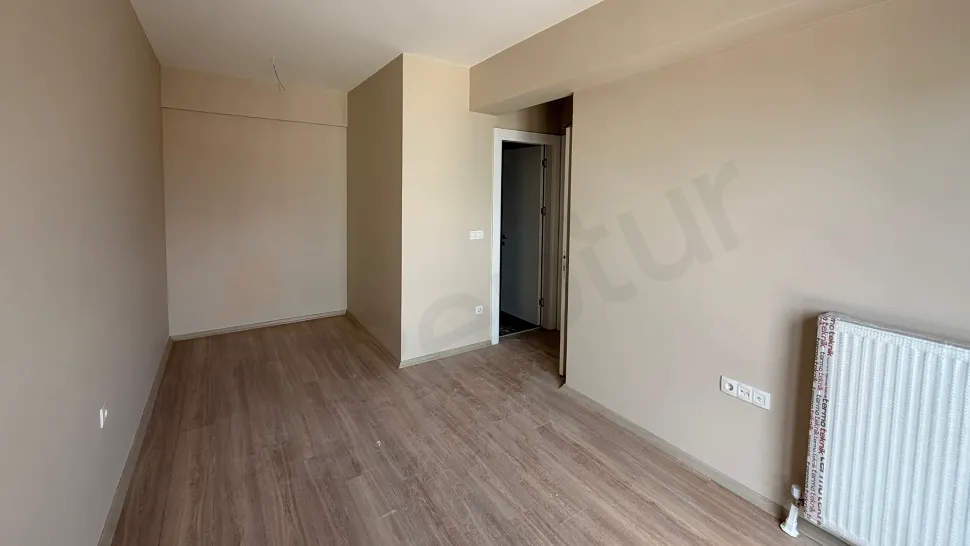Spacious and bright living room view of a modern apartment located in Pendik, Istanbul.